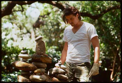  Brendan Fraser as Fletcher, building a cairn... 